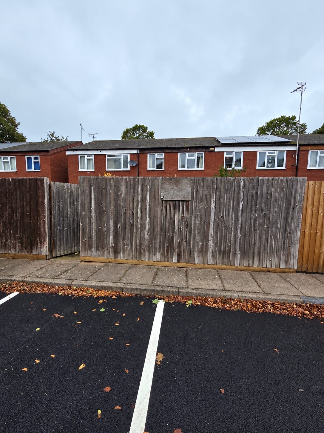 Weathered timber fence before the upgrade